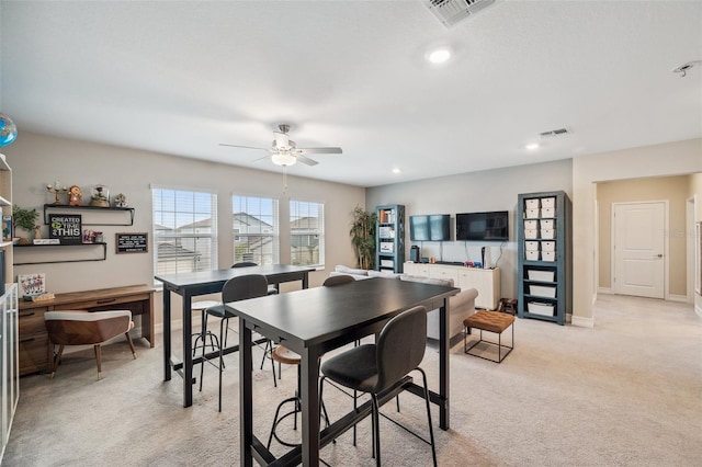 22294 Storybook Cabin Way, Land O Lakes, FL 34637 - dining space with light colored carpet, a ceiling fan, baseboards, and recessed lighting