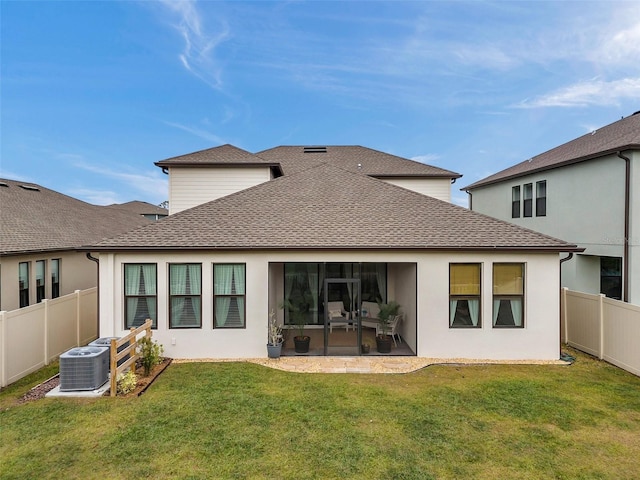 22294 Storybook Cabin Way, Land O Lakes, FL 34637 - back of house featuring cooling unit, roof with shingles, and a sunroom