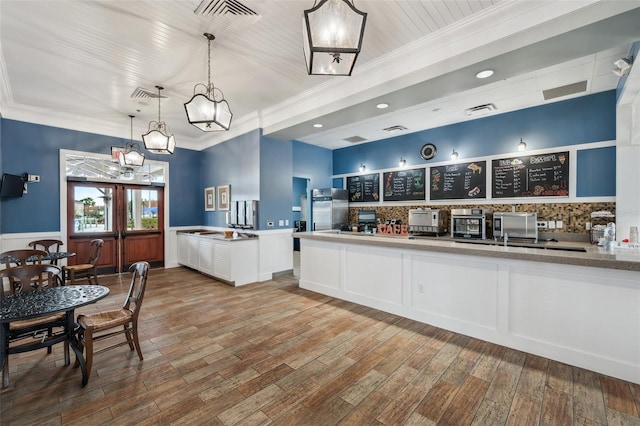 22294 Storybook Cabin Way, Land O Lakes, FL 34637 - reception area with ornamental molding, a chandelier, and recessed lighting