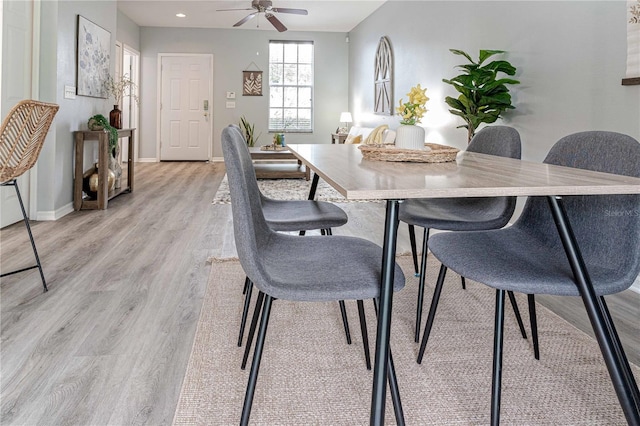 dining space featuring ceiling fan, light wood finished floors, recessed lighting, and baseboards