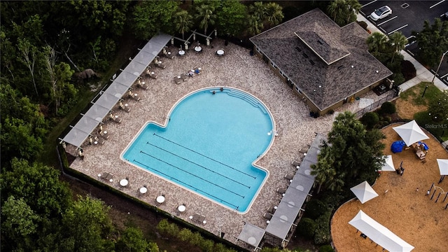 drone / aerial view of a pool