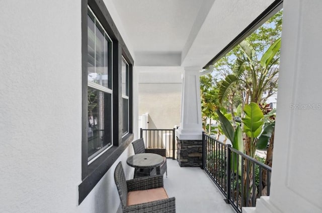 balcony featuring a porch