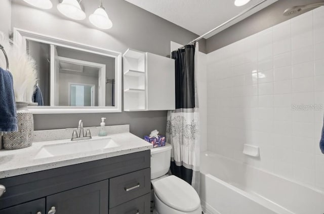 bathroom featuring toilet, vanity, and shower / bathtub combination with curtain