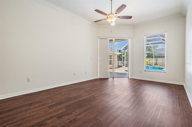 12421 Seabrook Dr, Tampa, FL 33626 - spare room with ceiling fan, dark wood-style flooring, ornamental molding, and baseboards