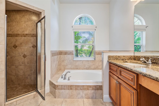 12421 Seabrook Dr, Tampa, FL 33626 - bathroom with healthy amount of natural light, a bath, a stall shower, and vanity