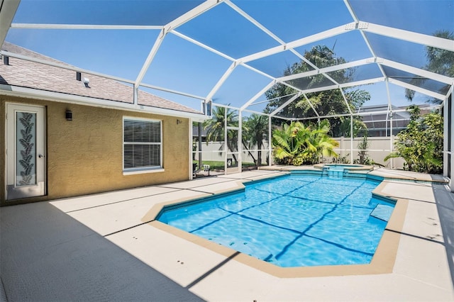 12421 Seabrook Dr, Tampa, FL 33626 - view of swimming pool with a patio area, a pool with connected hot tub, and a lanai