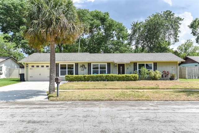 781 Little Pine Dr, South Daytona, FL 32119 - ranch-style house with a garage and driveway