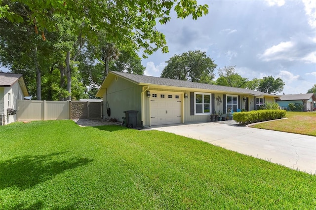 781 Little Pine Dr, South Daytona, FL 32119 - ranch-style house featuring an attached garage and driveway