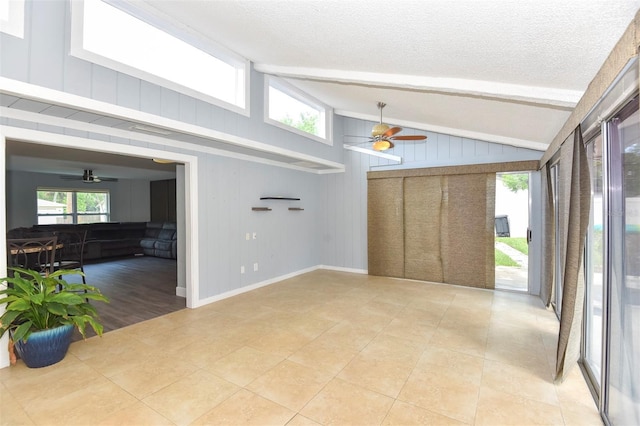 781 Little Pine Dr, South Daytona, FL 32119 - unfurnished room featuring a ceiling fan, light tile patterned floors, plenty of natural light, and a textured ceiling
