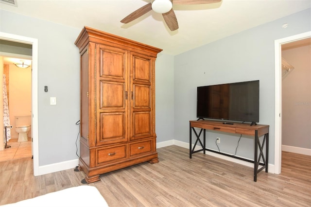 781 Little Pine Dr, South Daytona, FL 32119 - bedroom with light wood-type flooring, baseboards, and a ceiling fan