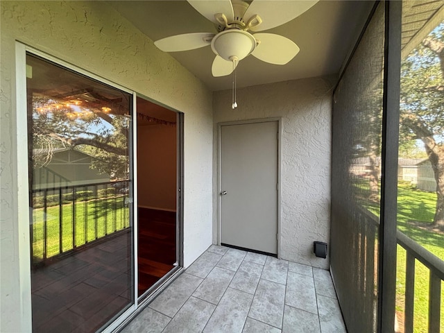 14446 Reuter Strasse Cir Unit 3, Tampa, FL 33613 - unfurnished sunroom with healthy amount of natural light and ceiling fan