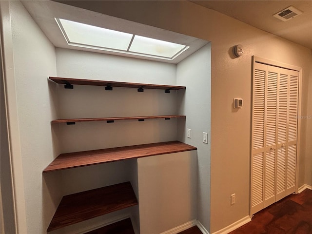 14446 Reuter Strasse Cir Unit 3, Tampa, FL 33613 - interior space featuring baseboards and dark wood-style flooring