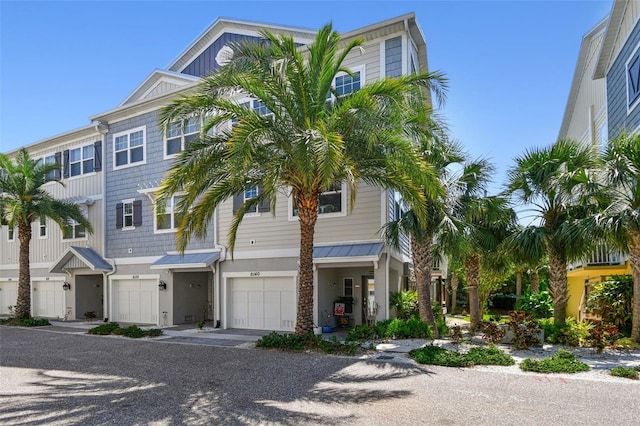 6140 Marina Cove Way S, Saint Petersburg, FL 33712 - townhome / multi-family property with a garage and driveway