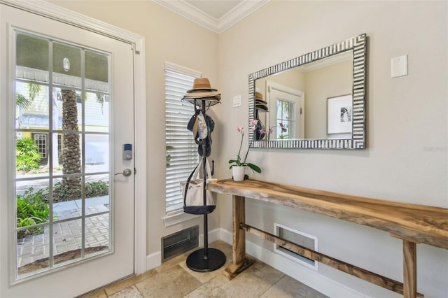 6140 Marina Cove Way S, Saint Petersburg, FL 33712 - entryway featuring crown molding, baseboards, and stone tile flooring
