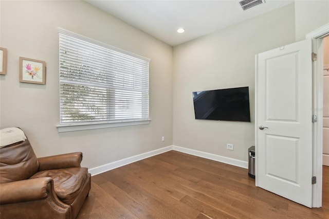 6140 Marina Cove Way S, Saint Petersburg, FL 33712 - sitting room with dark wood finished floors, baseboards, and recessed lighting