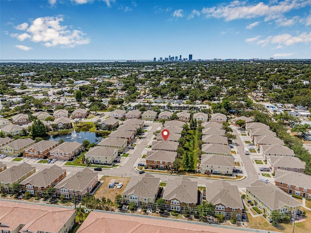 aerial view of residential area with a nearby body of water