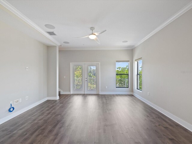 946 Highland Ave Unit 24, Dunedin, FL 34698 - unfurnished room with a ceiling fan, crown molding, dark wood finished floors, baseboards, and french doors