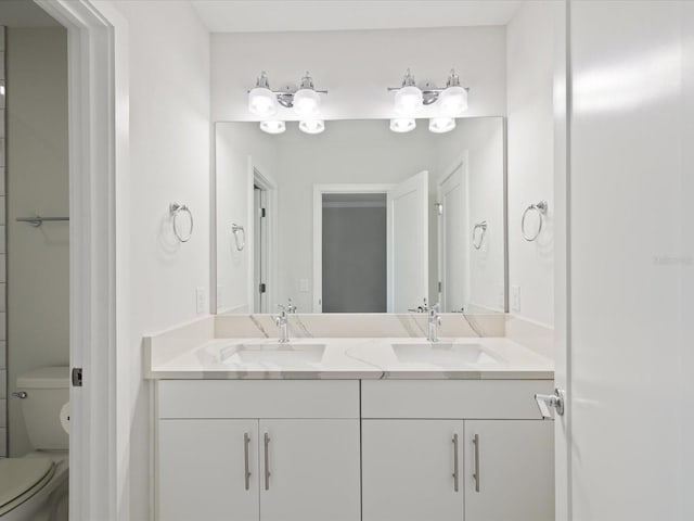 946 Highland Ave Unit 24, Dunedin, FL 34698 - bathroom with toilet and double vanity