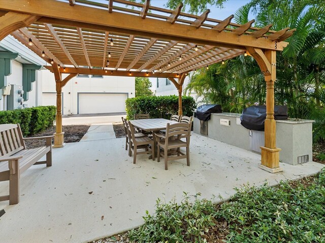 946 Highland Ave Unit 24, Dunedin, FL 34698 - view of patio / terrace featuring area for grilling, outdoor dining space, and a pergola