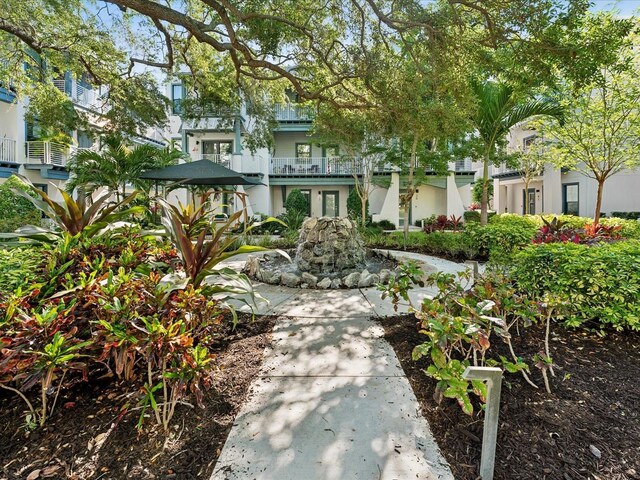 946 Highland Ave Unit 24, Dunedin, FL 34698 - view of front of property featuring stucco siding