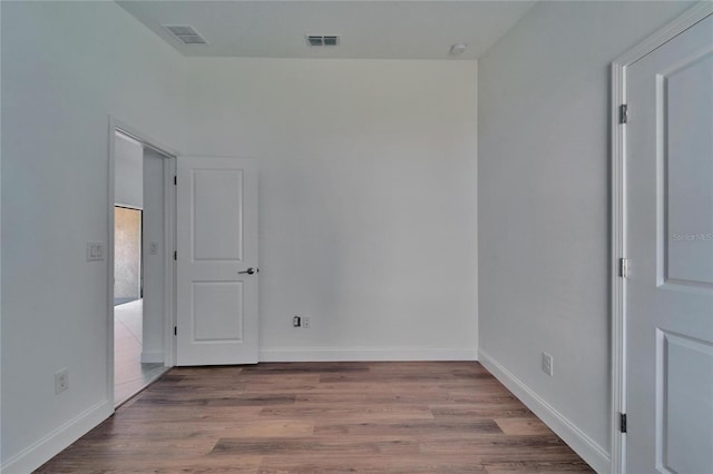 12055 Cardinal Flower Dr, Riverview, FL 33579 - empty room with wood finished floors and baseboards