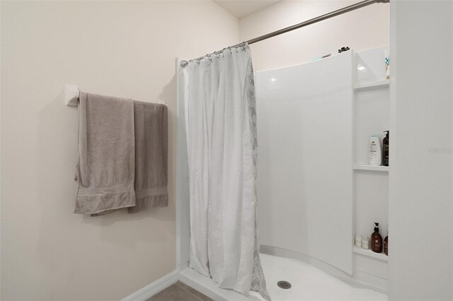 2449 Moon Shadow Rd, New Port Richey, FL 34655 - bathroom with a shower stall