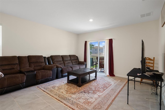 2449 Moon Shadow Rd, New Port Richey, FL 34655 - living room with light tile patterned floors and recessed lighting