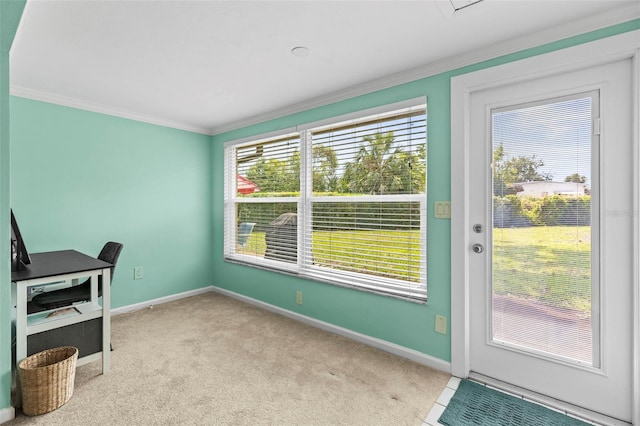 unfurnished office featuring ornamental molding, baseboards, and carpet flooring