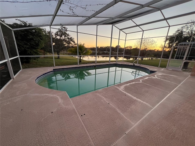 18104 Sweet Jasmine Dr, Tampa, FL 33647 - pool at dusk featuring an outdoor pool and a patio