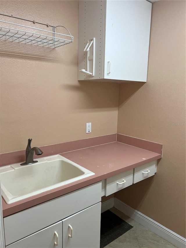 18104 Sweet Jasmine Dr, Tampa, FL 33647 - washroom featuring a sink and tile patterned floors