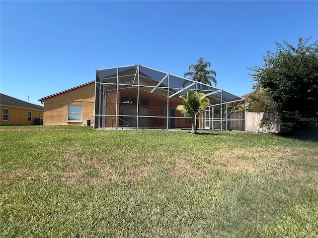 18104 Sweet Jasmine Dr, Tampa, FL 33647 - back of house featuring a lanai