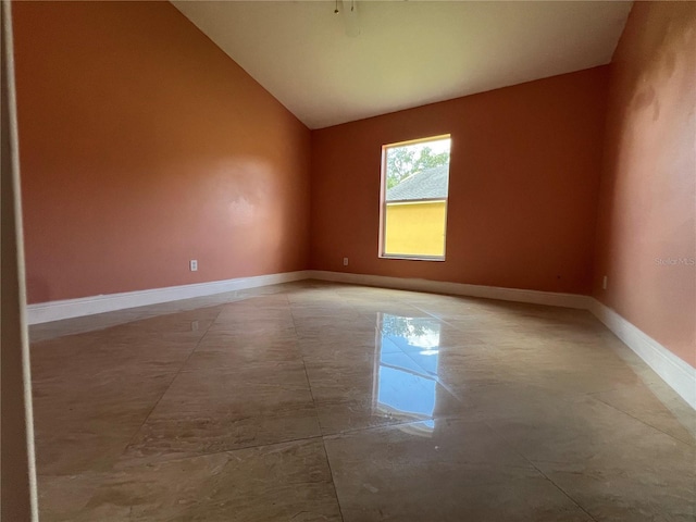 18104 Sweet Jasmine Dr, Tampa, FL 33647 - unfurnished room featuring vaulted ceiling and baseboards