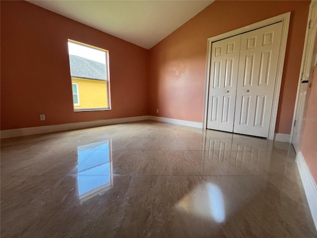 18104 Sweet Jasmine Dr, Tampa, FL 33647 - unfurnished bedroom with vaulted ceiling and a closet