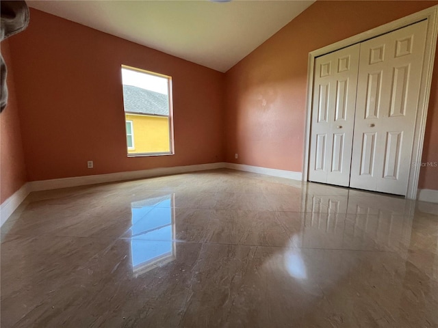 18104 Sweet Jasmine Dr, Tampa, FL 33647 - unfurnished bedroom with vaulted ceiling and a closet