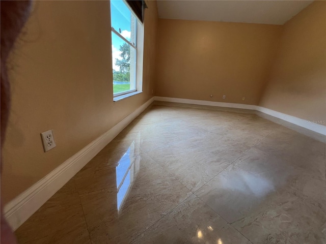18104 Sweet Jasmine Dr, Tampa, FL 33647 - spare room featuring baseboards