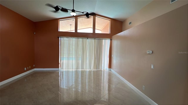 18104 Sweet Jasmine Dr, Tampa, FL 33647 - unfurnished room featuring lofted ceiling and baseboards