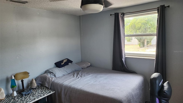 bedroom with a textured ceiling