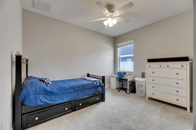 bedroom with carpet flooring, baseboards, and ceiling fan