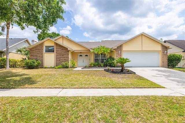 1426 Buckner Rd, Valrico, FL 33596 - view of front facade with an attached garage, concrete driveway, and a front lawn