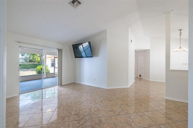 1426 Buckner Rd, Valrico, FL 33596 - unfurnished room featuring a chandelier, baseboards, and light marble finish flooring