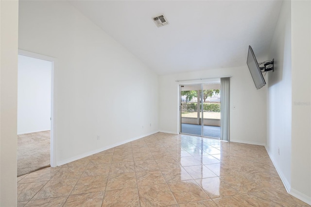1426 Buckner Rd, Valrico, FL 33596 - spare room with vaulted ceiling and baseboards