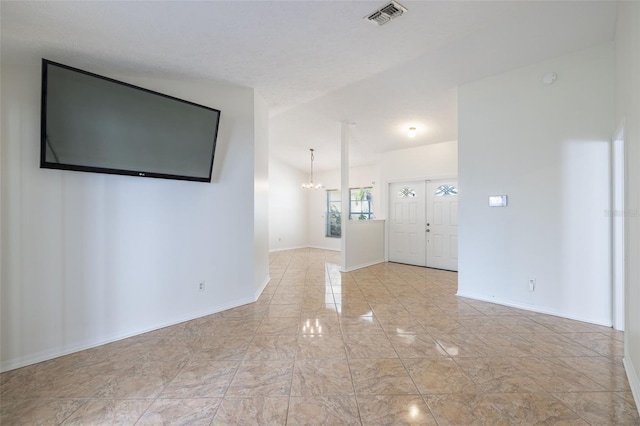 1426 Buckner Rd, Valrico, FL 33596 - spare room with a chandelier and baseboards