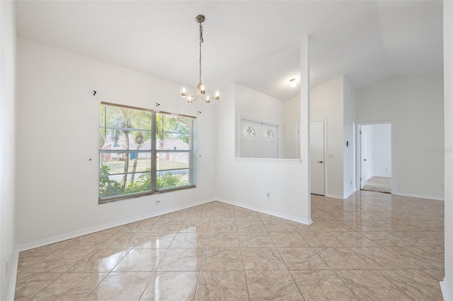 1426 Buckner Rd, Valrico, FL 33596 - empty room with a chandelier, vaulted ceiling, light marble finish floors, and baseboards