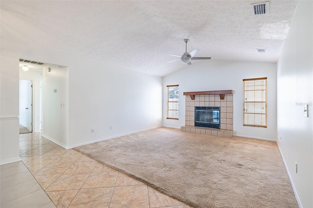 1426 Buckner Rd, Valrico, FL 33596 - unfurnished living room with ceiling fan, healthy amount of natural light, carpet flooring, vaulted ceiling, and a textured ceiling