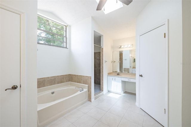 1426 Buckner Rd, Valrico, FL 33596 - full bath featuring vaulted ceiling, ceiling fan, tile patterned floors, a shower stall, and a bath