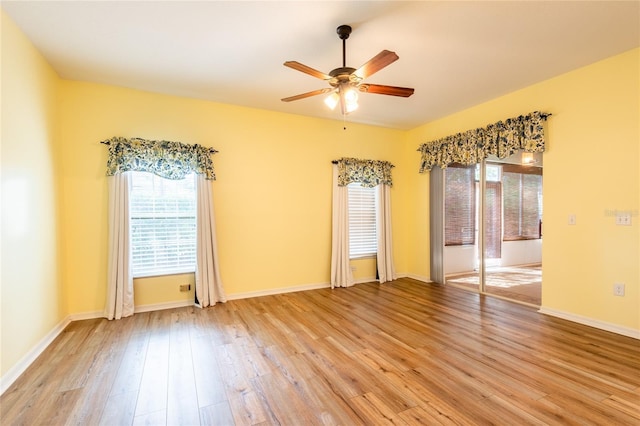 19025 Callaway Ct, Tampa, FL 33647 - unfurnished bedroom featuring light wood-type flooring, baseboards, and ceiling fan