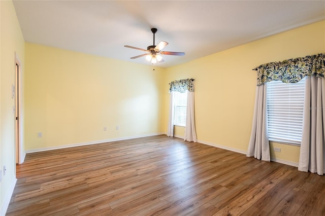19025 Callaway Ct, Tampa, FL 33647 - unfurnished room featuring ceiling fan, wood finished floors, and baseboards