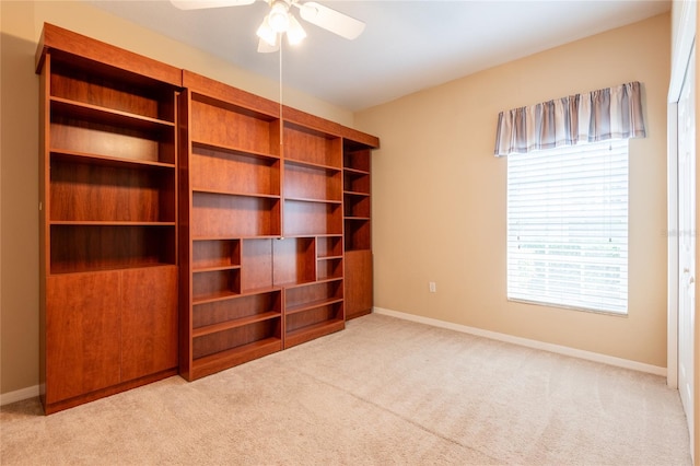 19025 Callaway Ct, Tampa, FL 33647 - carpeted spare room featuring baseboards and a ceiling fan