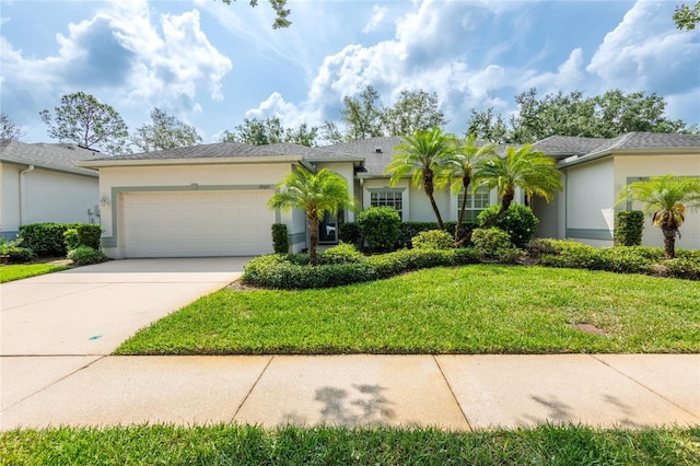 19025 Callaway Ct, Tampa, FL 33647 - single story home featuring stucco siding, an attached garage, concrete driveway, and a front yard