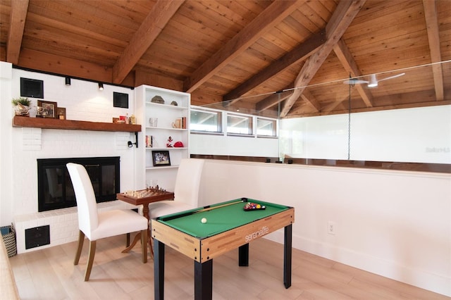 rec room featuring wooden ceiling, light wood-type flooring, billiards, a brick fireplace, and baseboards